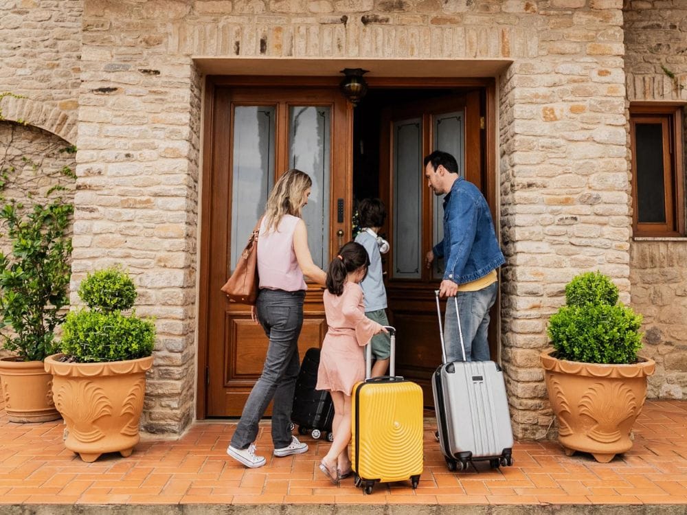Family leaving for summer vacation with a protected smart home security system